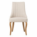 Silla de comedor en tela beige con patas de madera