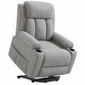 Sillón reclinable de tela gris con levantapersonas y portavasos