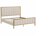 Cama doble de metal dorado con cabecero tapizado en tela beige