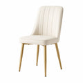 Silla de comedor tapizada en cuero sintético beige con patas de metal dorado